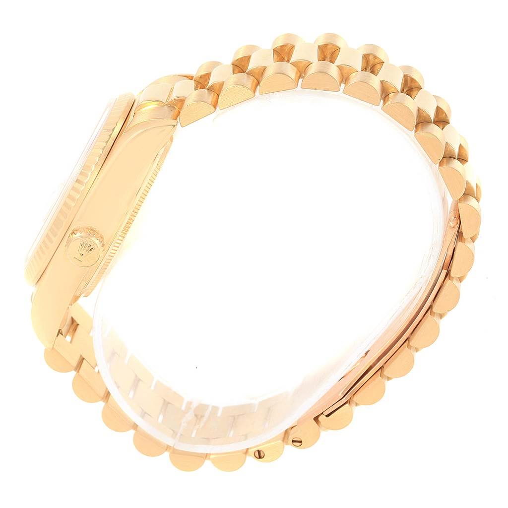 The image shows a side angle of the Rolex President 18038 Men's Yellow Gold White Dial 18038 Men's Yellow Gold White Dial model watch focused on the bracelet and case side.