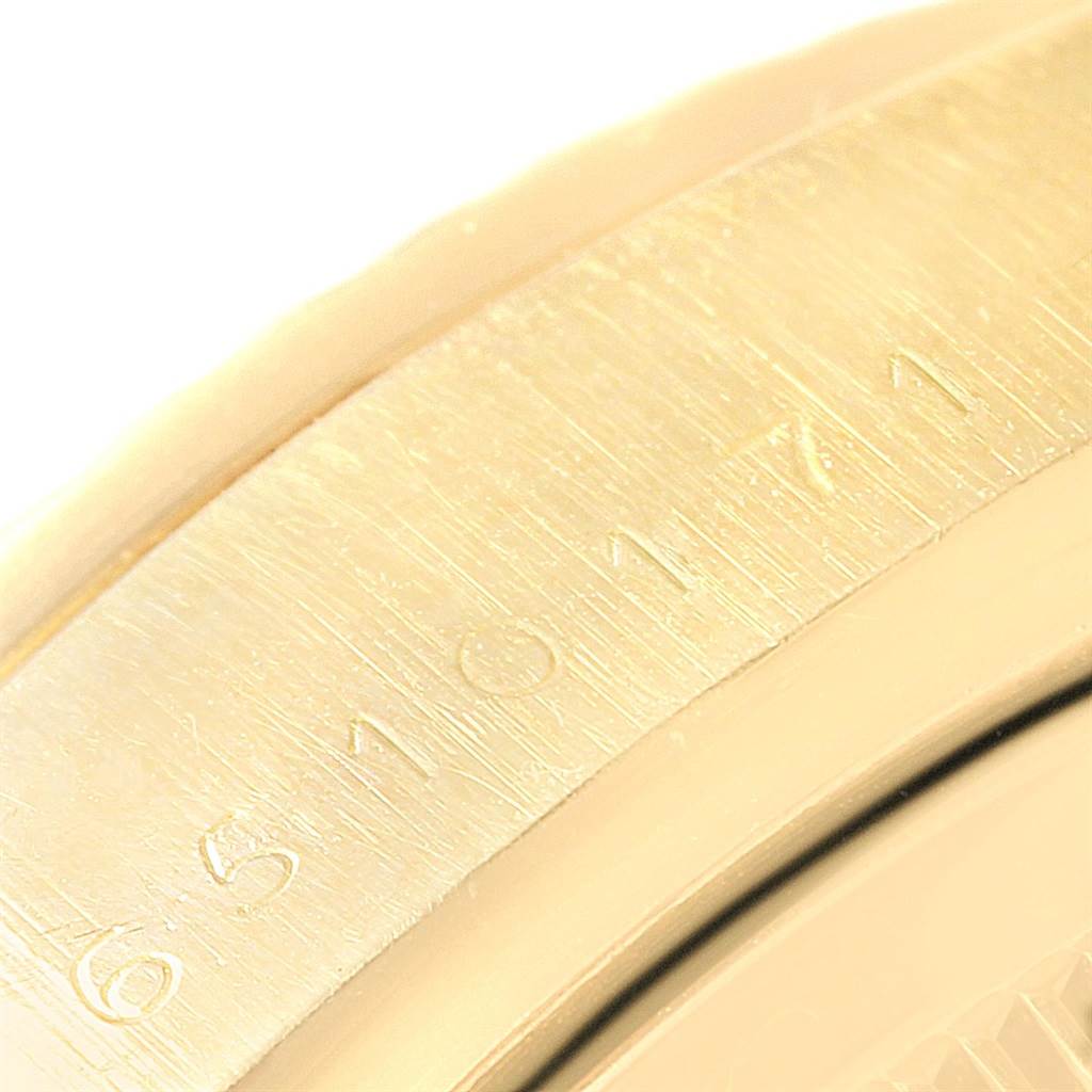 This image shows a close-up of the model number engraving on the bezel of a Rolex President 18038 Men's Yellow Gold White Dial 18038 Men's Yellow Gold White Dial watch.