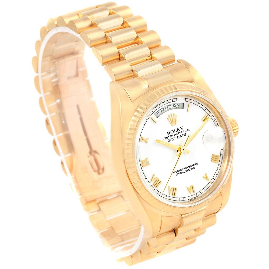 This image shows a side angle of the Rolex President 18038 Men's Yellow Gold White Dial 18038 Men's Yellow Gold White Dial model, highlighting the gold bracelet and white dial with the day and date display.