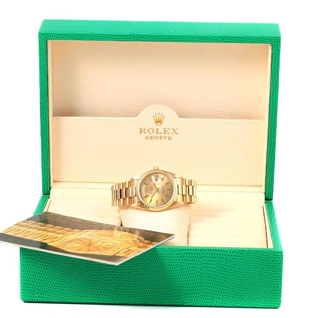 The image shows a Rolex President 18238 Men's Yellow Gold Champagne Dial 18238 Men's Yellow Gold Champagne Dial model watch from a front angle, inside its open green box with an instruction manual.