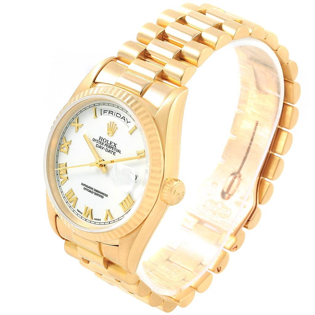 The image shows a Rolex President 18238 Men's Yellow Gold White Dial 18238 Men's Yellow Gold White Dial model watch from a three-quarter angle, highlighting its gold bracelet, dial, and crown.
