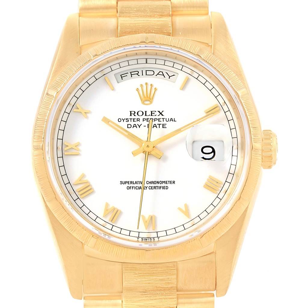 The image shows a front view of the Rolex President 18248 Men
s Yellow Gold White Dial 18248 Men
s Yellow Gold White Dial Day-Date watch displaying the dial, day, and date indicators.