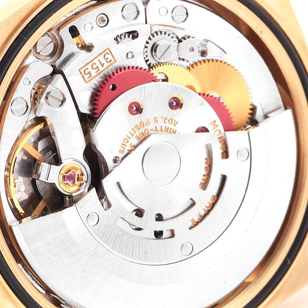 This image shows the internal mechanism of the Rolex President 18248 Men's Yellow Gold Mother of Pearl Dial 18248 Men's Yellow Gold Mother of Pearl Dial model watch, highlighting gears and the rotor.