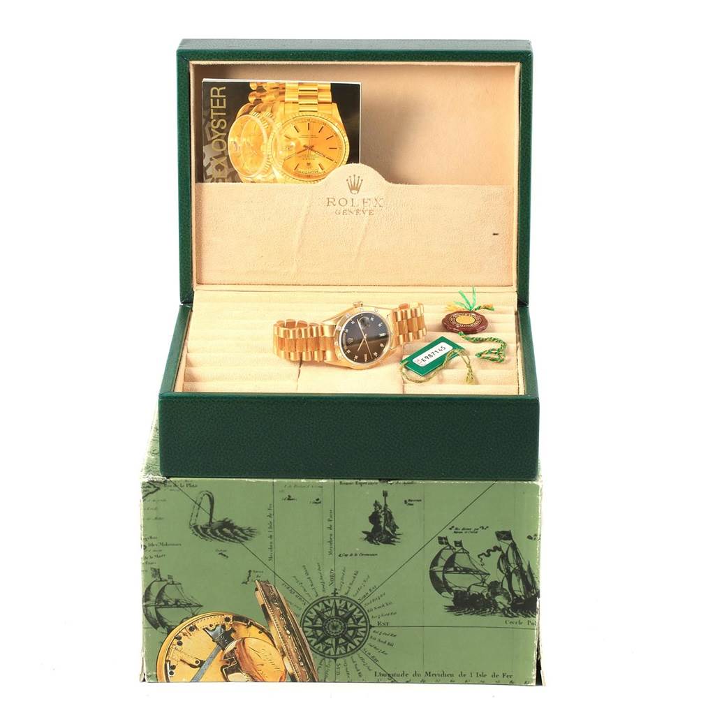 The image shows a Rolex President 18248 Men's Yellow Gold Brown Dial 18248 Men's Yellow Gold Brown Dial model watch in its opened box with tags and booklets.