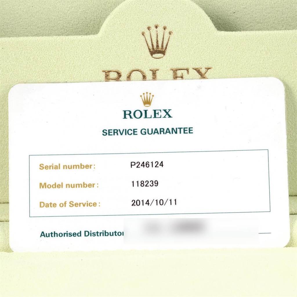 The image shows a Rolex service guarantee card for the President model, displaying serial and model numbers and the date of service.