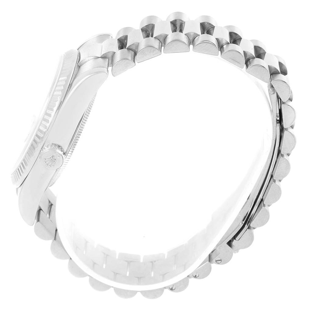 The image shows a side view of a Rolex President 118239 Men's White Gold Silver Dial 118239 Men's White Gold Silver Dial model watch, highlighting the crown, bezel, and bracelet.