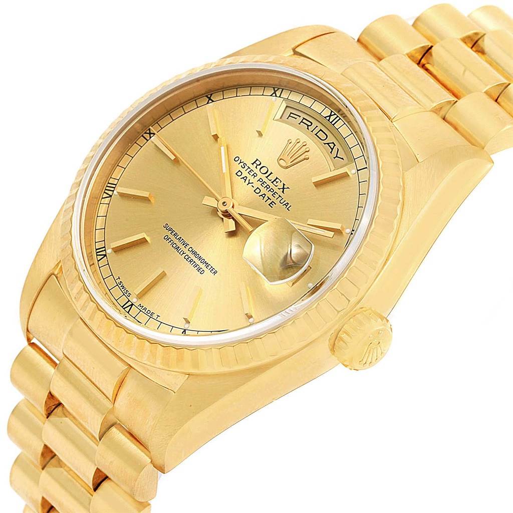 The image shows a close-up angle of the Rolex President 18238 Men
s Yellow Gold Champagne Dial 18238 Men
s Yellow Gold Champagne Dial model, displaying its gold dial, day-date feature, and part of the bracelet.