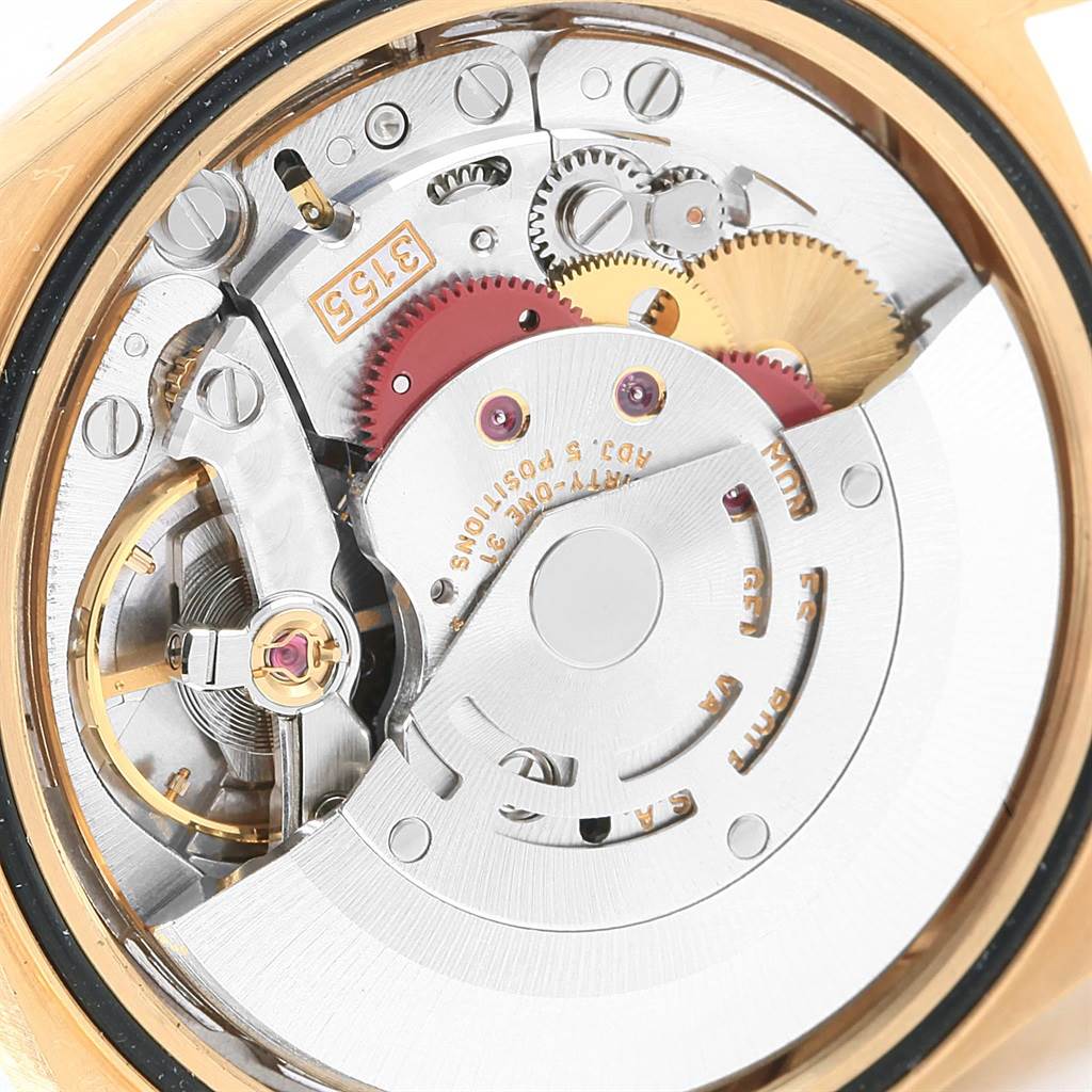 The image shows the internal mechanism and movement of a Rolex President 18238 Men's Yellow Gold Champagne Dial 18238 Men's Yellow Gold Champagne Dial model watch from a close-up angle.