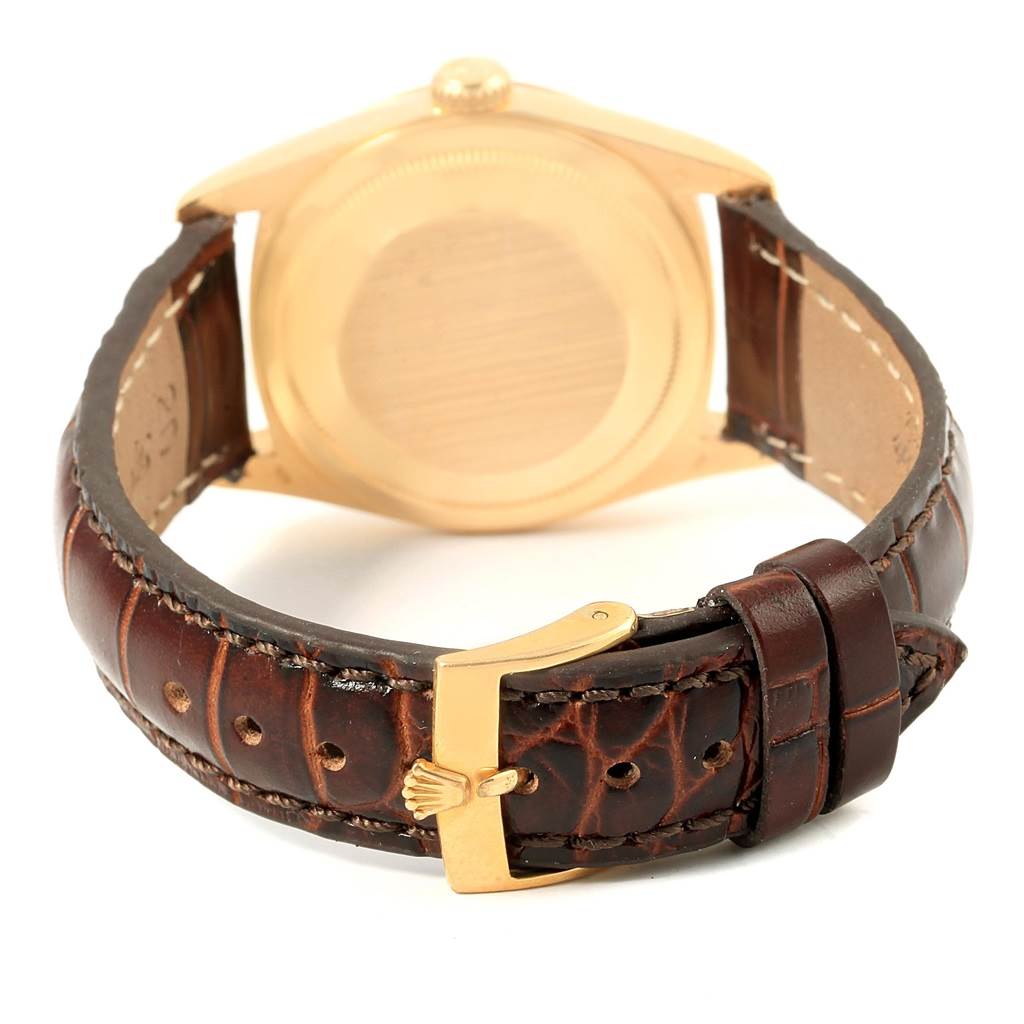 The image shows the back case and leather strap of a Rolex President 18238 Men's Yellow Gold Champagne Dial 18238 Men's Yellow Gold Champagne Dial model watch.