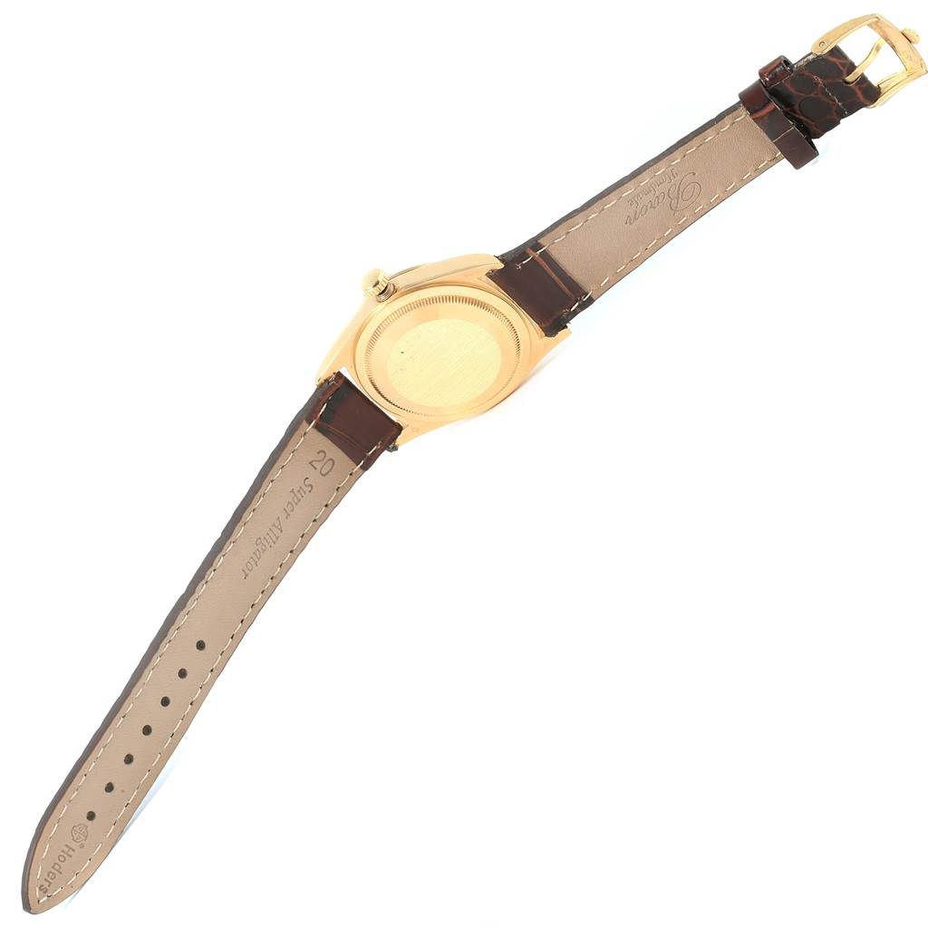 The image shows the back and strap of a Rolex President 18238 Men's Yellow Gold Champagne Dial 18238 Men's Yellow Gold Champagne Dial model in an open and laid flat position.