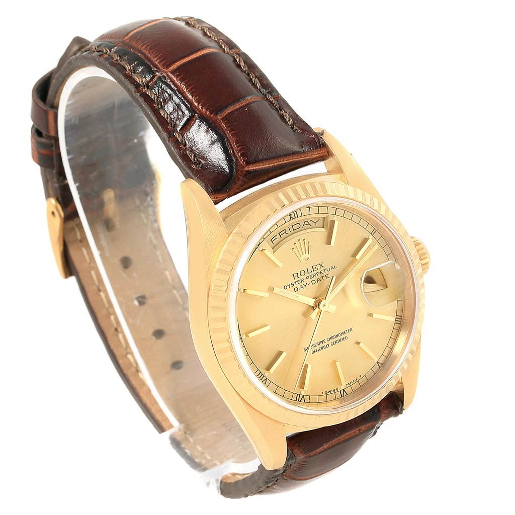 The image shows a Rolex President 18238 Men's Yellow Gold Champagne Dial 18238 Men's Yellow Gold Champagne Dial model watch angled from the front-left, highlighting its gold case, dial, and brown leather strap.