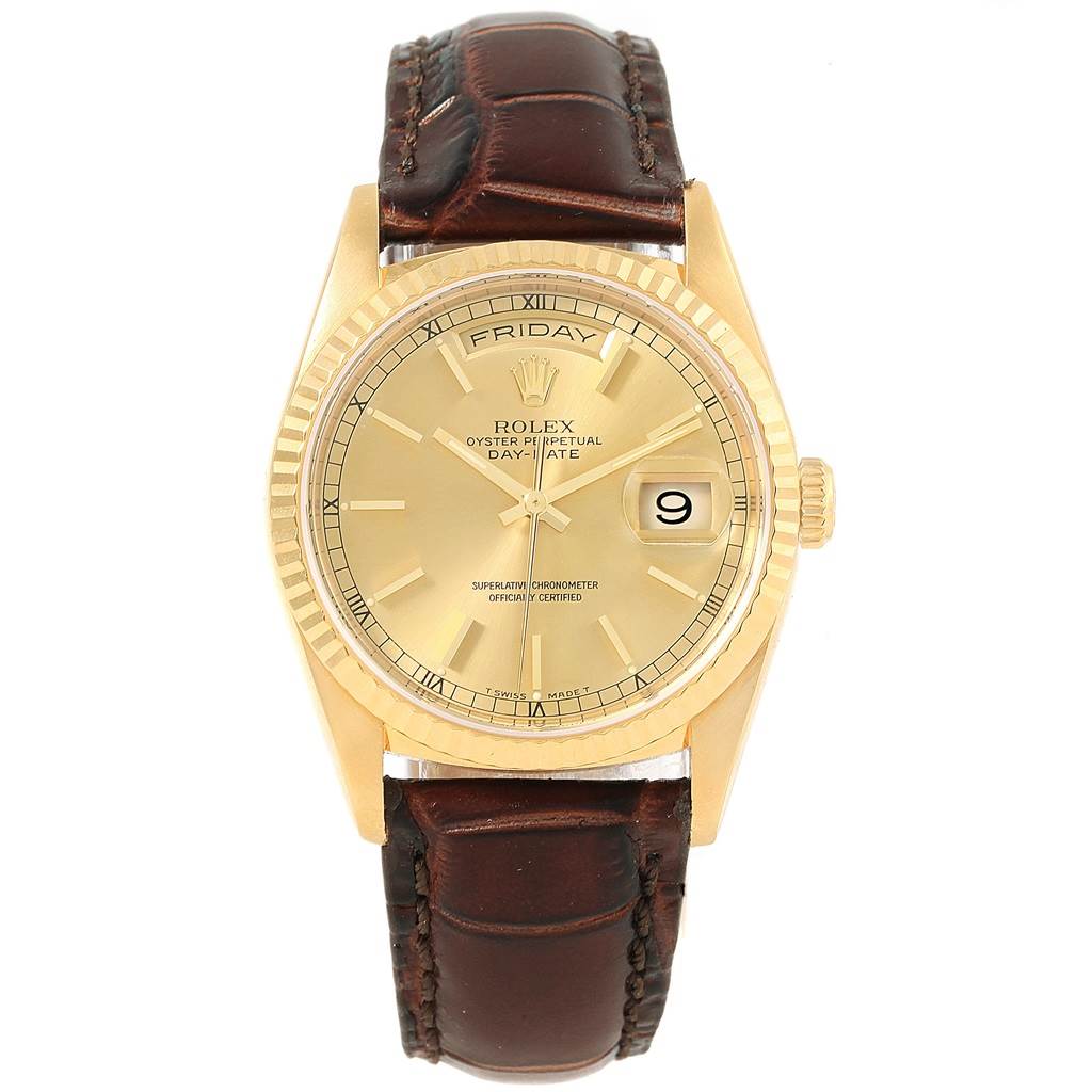 The image shows a front view of the Rolex President 18238 Men's Yellow Gold Champagne Dial 18238 Men's Yellow Gold Champagne Dial model watch, highlighting its gold bezel, dial, and date window, with a brown leather strap.