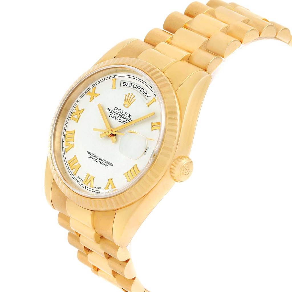 The image showcases a Rolex President 118238 Men's Yellow Gold White Dial 118238 Men's Yellow Gold White Dial model watch at an angle highlighting its gold case, fluted bezel, white dial, and bracelet.