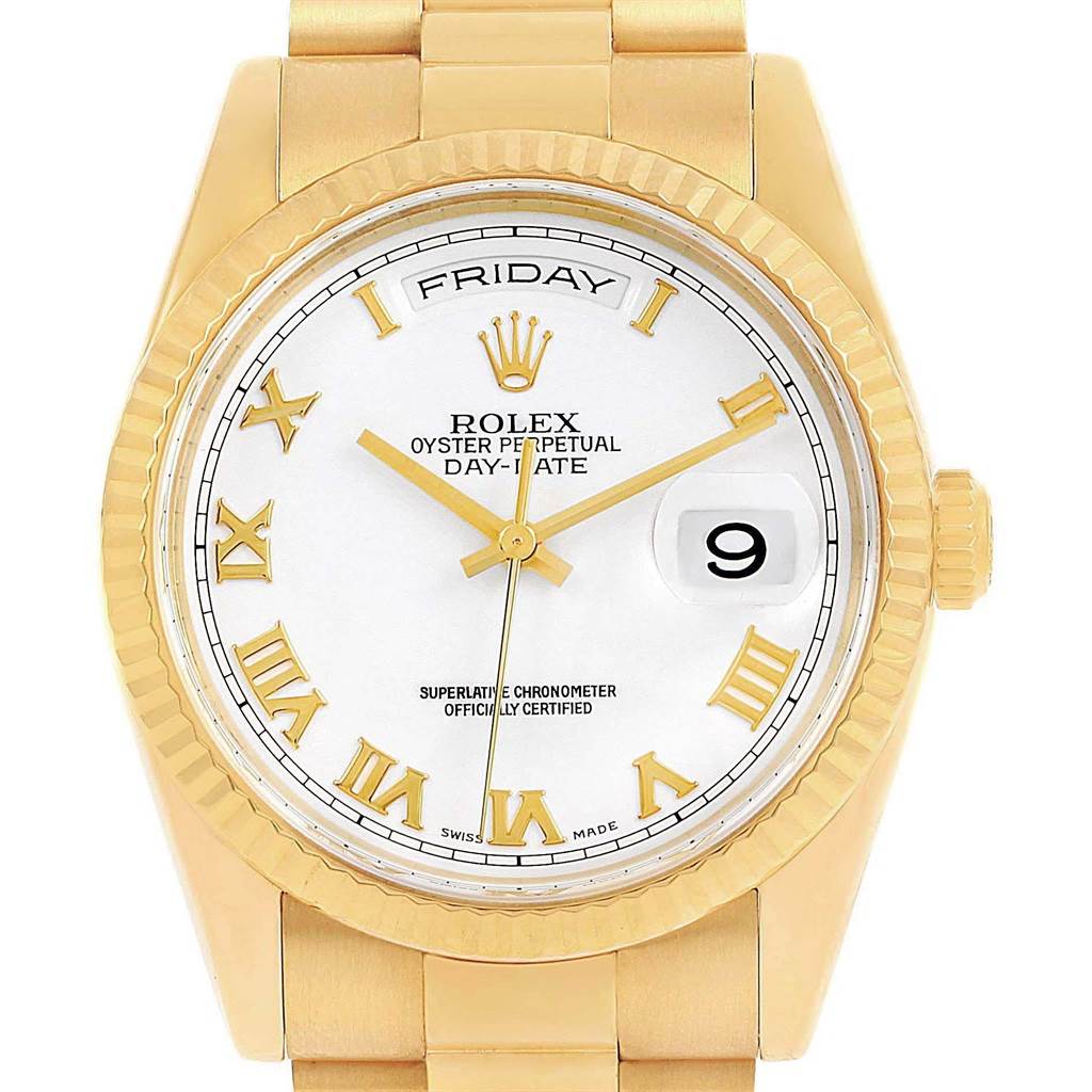 This image shows a frontal view of the Rolex President 118238 Men's Yellow Gold White Dial 118238 Men's Yellow Gold White Dial model watch, highlighting the face, fluted bezel, and part of the bracelet.