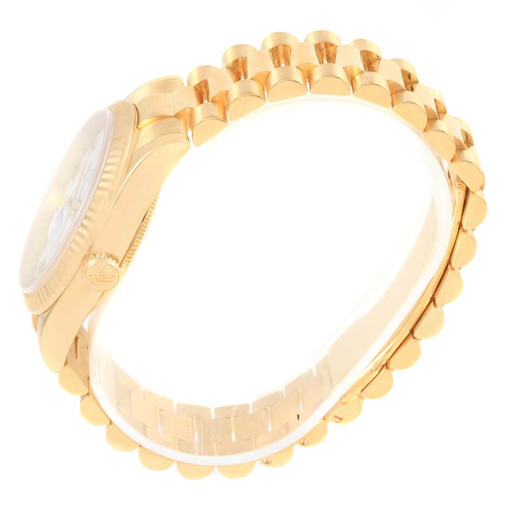 The image shows a side view of the Rolex President 118238 Men's Yellow Gold White Dial 118238 Men's Yellow Gold White Dial model watch, highlighting its gold case and bracelet.