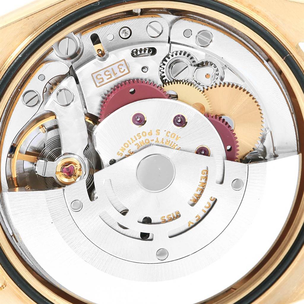 This image shows a close-up of the movement and internal mechanisms of a Rolex President 118238 Men's Yellow Gold White Dial 118238 Men's Yellow Gold White Dial model watch.