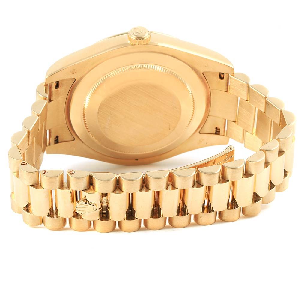 The image shows the back view of a Rolex President 218238 Men's Yellow Gold Champagne Dial 218238 Men's Yellow Gold Champagne Dial model watch, highlighting its case back and gold bracelet.