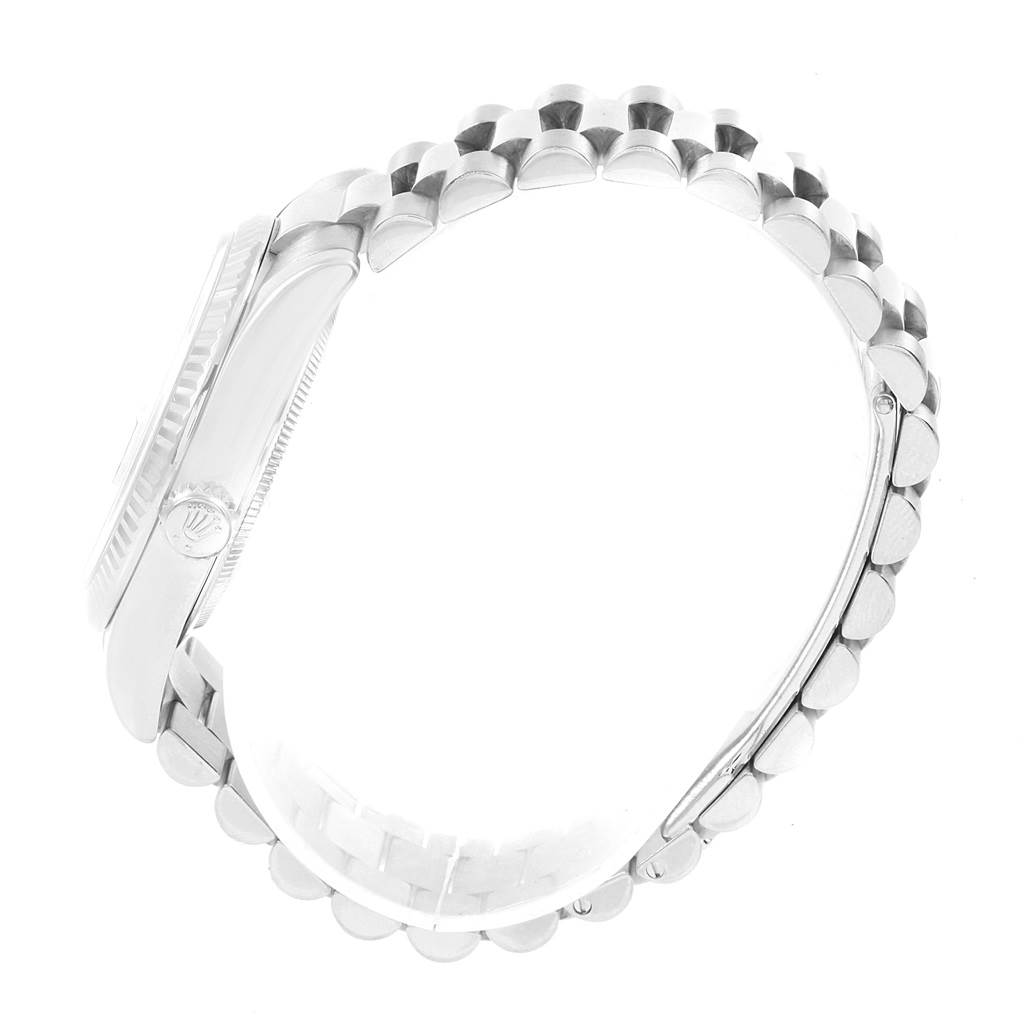 This side view image of a Rolex President 118239 Men's White Gold Black Dial 118239 Men's White Gold Black Dial model watch showcases its case and distinctive bracelet.