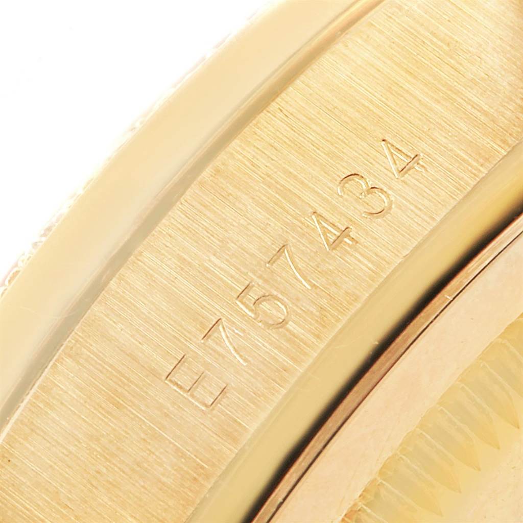This image shows a close-up angle of the serial number engraved on the side of a Rolex President 18388 Men
s Yellow Gold Champagne Dial 18388 Men
s Yellow Gold Champagne Dial model watch.