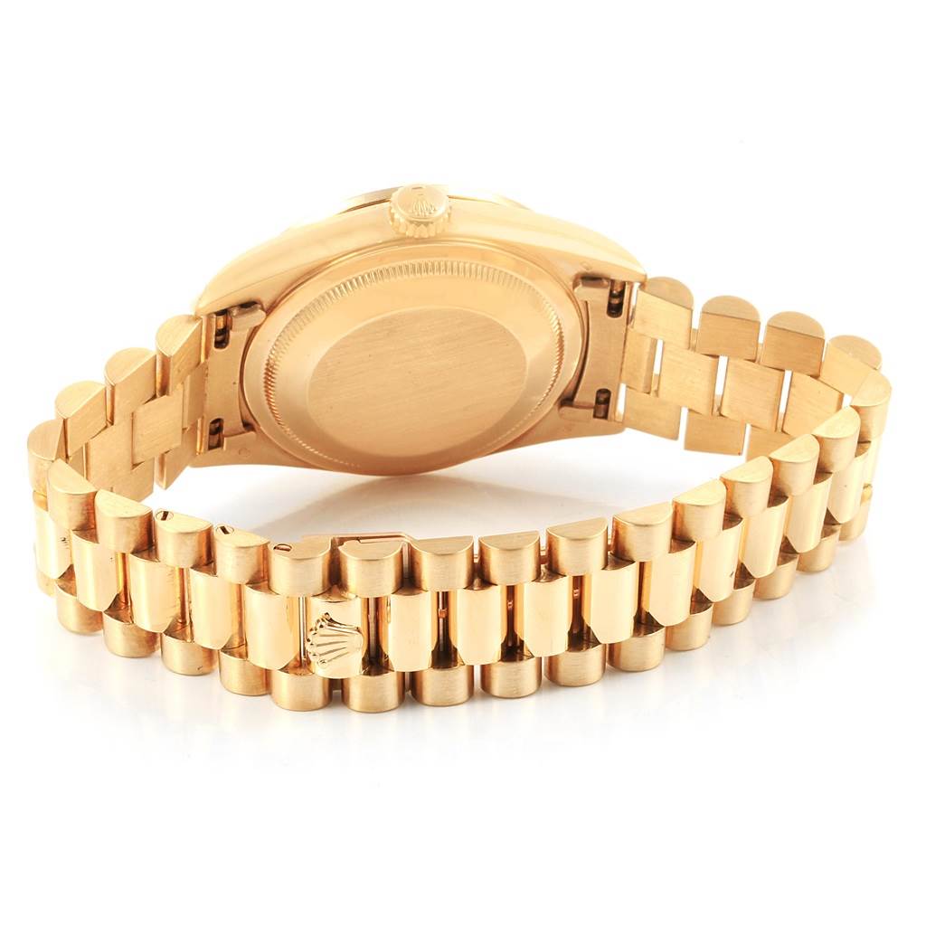 The image shows the back case and bracelet of a Rolex President 18388 Men
s Yellow Gold Champagne Dial 18388 Men
s Yellow Gold Champagne Dial model watch, taken from a rear angle.