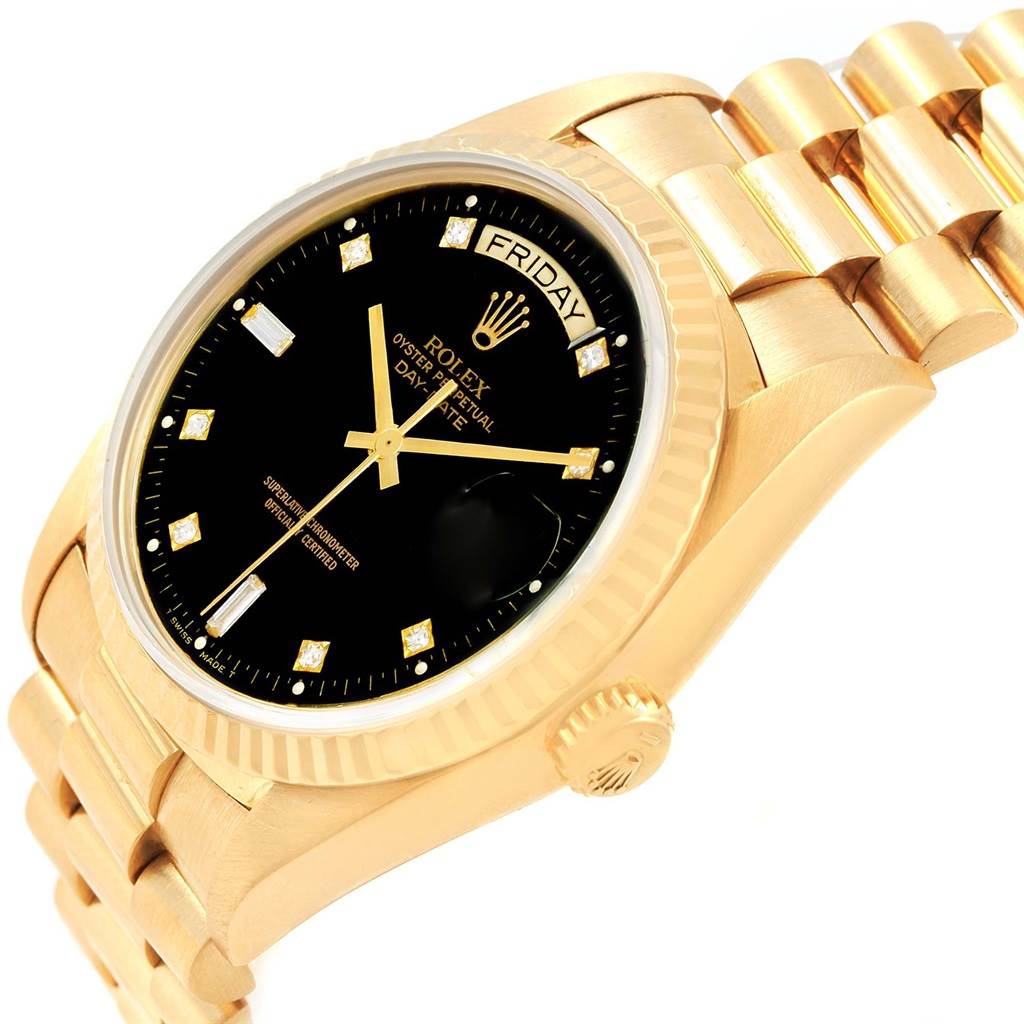 This image shows a gold Rolex President 18038 Men's Yellow Gold Black Dial 18038 Men's Yellow Gold Black Dial model watch from a close-up side angle, highlighting its black dial, bracelet, and crown.