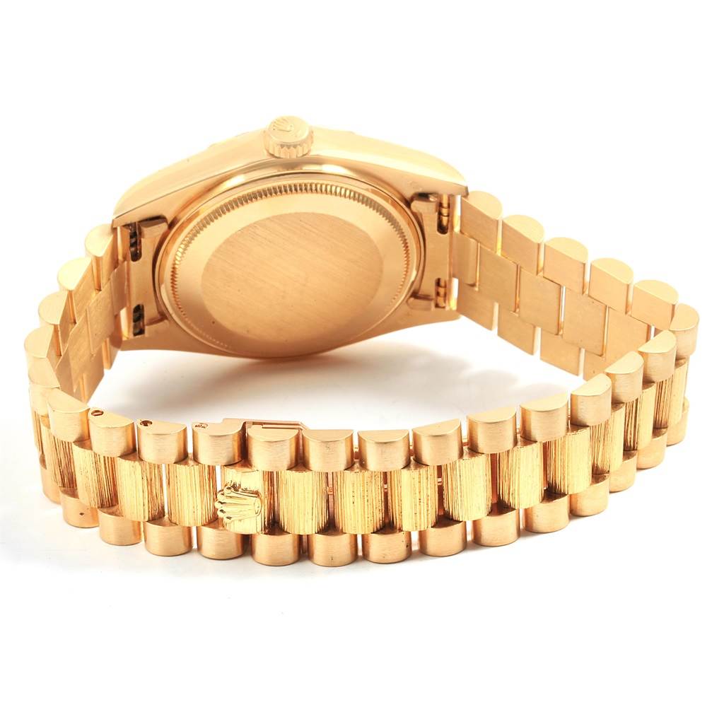 The image shows the back case and bracelet of a Rolex President 18078 Men
s Yellow Gold Champagne Dial 18078 Men
s Yellow Gold Champagne Dial model watch from a rear angle.