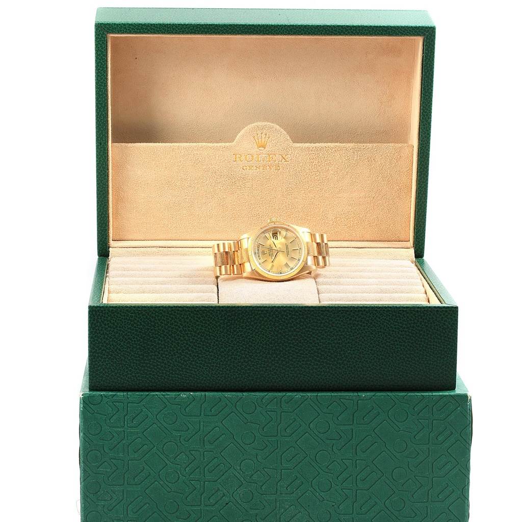 The image shows a Rolex President 18078 Men
s Yellow Gold Champagne Dial 18078 Men
s Yellow Gold Champagne Dial model watch placed inside an open Rolex box, viewed from the front.