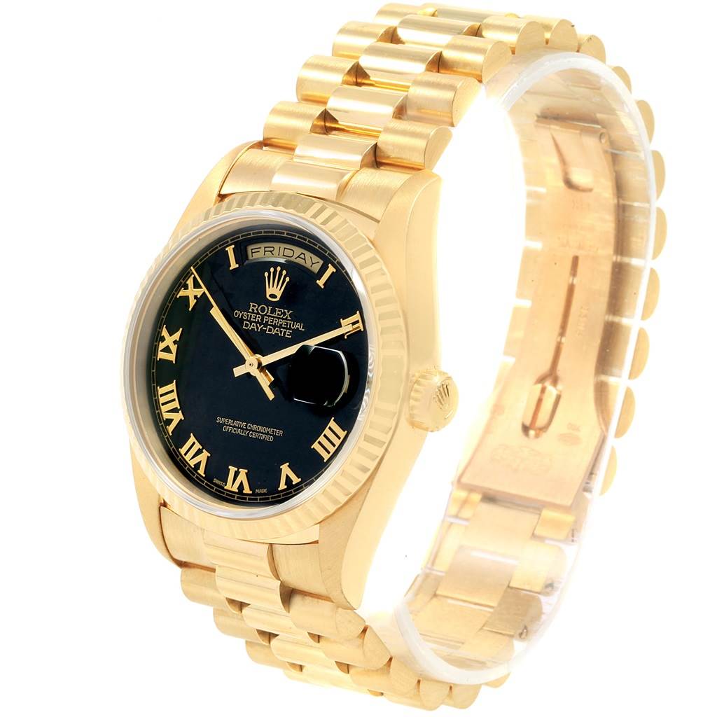 The Rolex President 18238 Men's Yellow Gold Black Dial 18238 Men's Yellow Gold Black Dial watch is shown at a slight angle, highlighting its gold case, bracelet, and black dial.