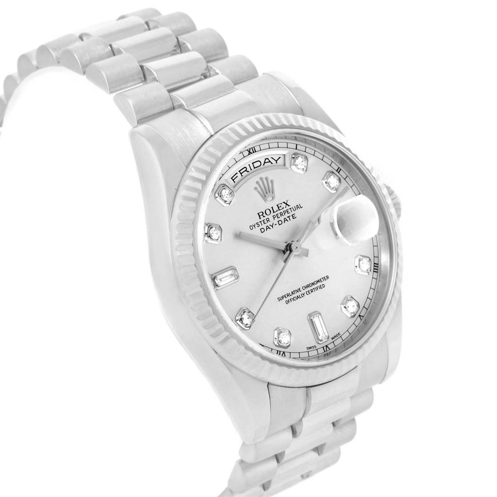 This image shows a Rolex President 118239 Men's White Gold Silver Dial 118239 Men's White Gold Silver Dial model watch at an angled view highlighting the face, bezel, and part of the bracelet.