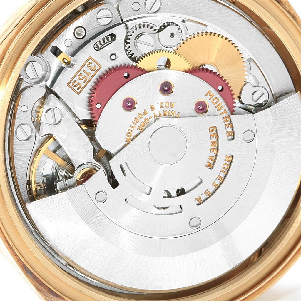 The image shows the intricate mechanical movement from the back of a Rolex President 18238 Men's Yellow Gold Champagne Dial 18238 Men's Yellow Gold Champagne Dial model watch.