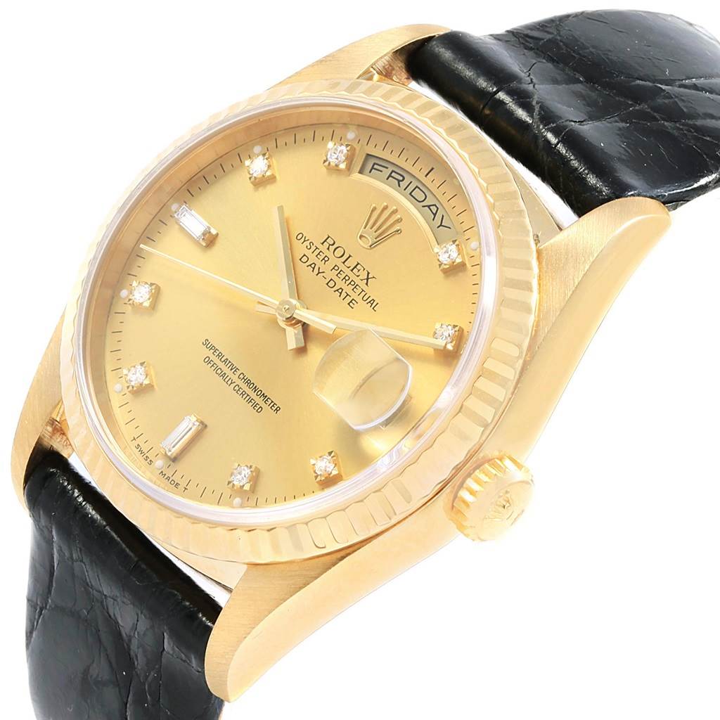 The Rolex President 18238 Men's Yellow Gold Champagne Dial 18238 Men's Yellow Gold Champagne Dial model watch is shown at an angled close-up, highlighting the dial, bezel, crown, and part of the leather strap.