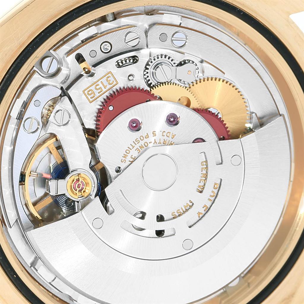 The image shows the internal mechanical movement of a Rolex President 218238 Men's Yellow Gold Champagne Dial 218238 Men's Yellow Gold Champagne Dial model watch from a rear angle.