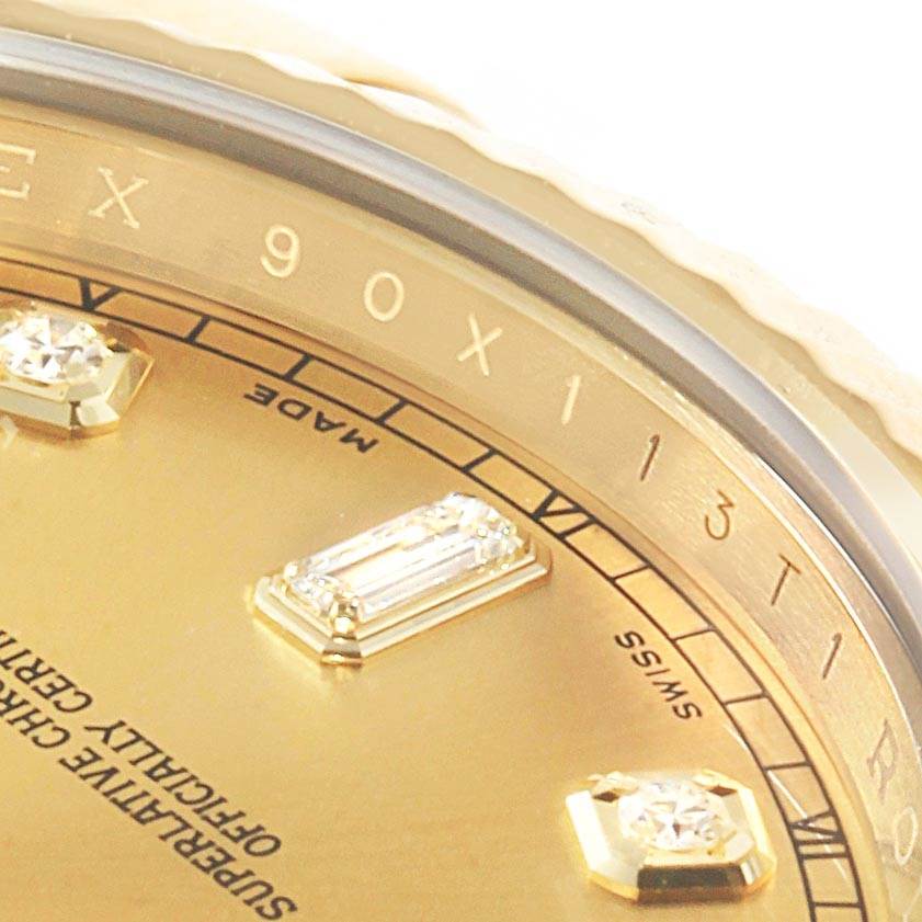 This image shows a close-up of the dial and diamond hour markers of a Rolex President 218238 Men's Yellow Gold Champagne Dial 218238 Men's Yellow Gold Champagne Dial watch.