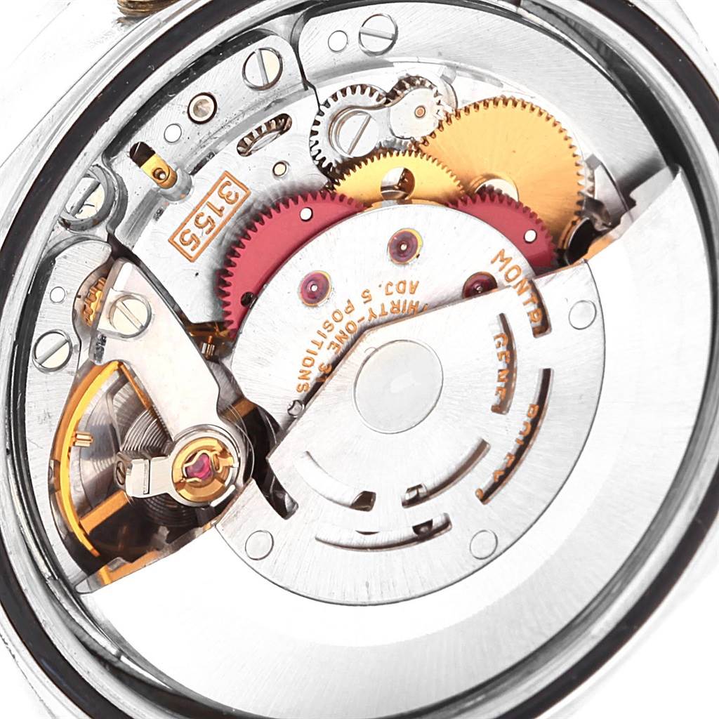 This is a close-up of the movement inside the Rolex President 18206 Men's Platinum Blue Dial 18206 Men's Platinum Blue Dial watch, showing gears and mechanical components.