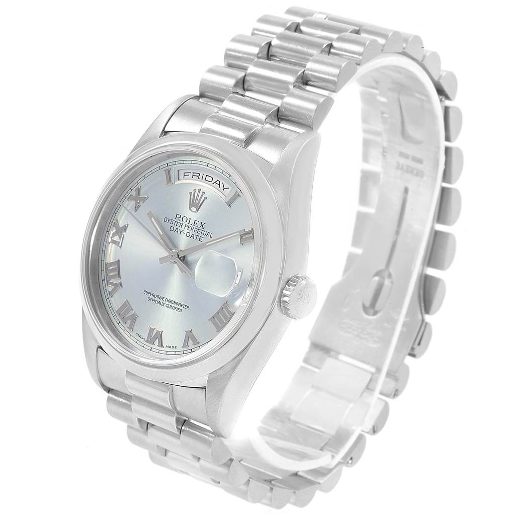 A Rolex President 18206 Men's Platinum Blue Dial 18206 Men's Platinum Blue Dial model watch is shown at an angle highlighting its face, bracelet, and crown.