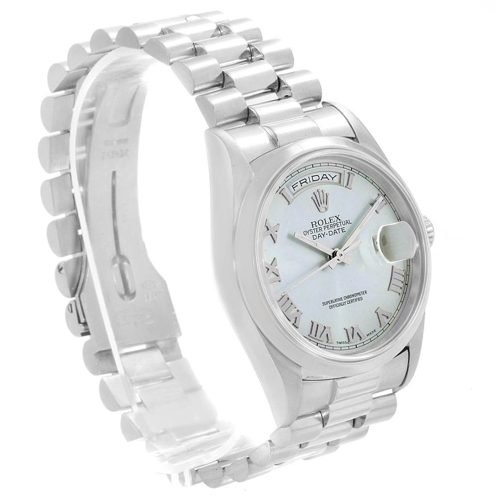 The Rolex President 18206 Men's Platinum Blue Dial 18206 Men's Platinum Blue Dial watch is shown at an angle highlighting its face, band, and partially open clasp.