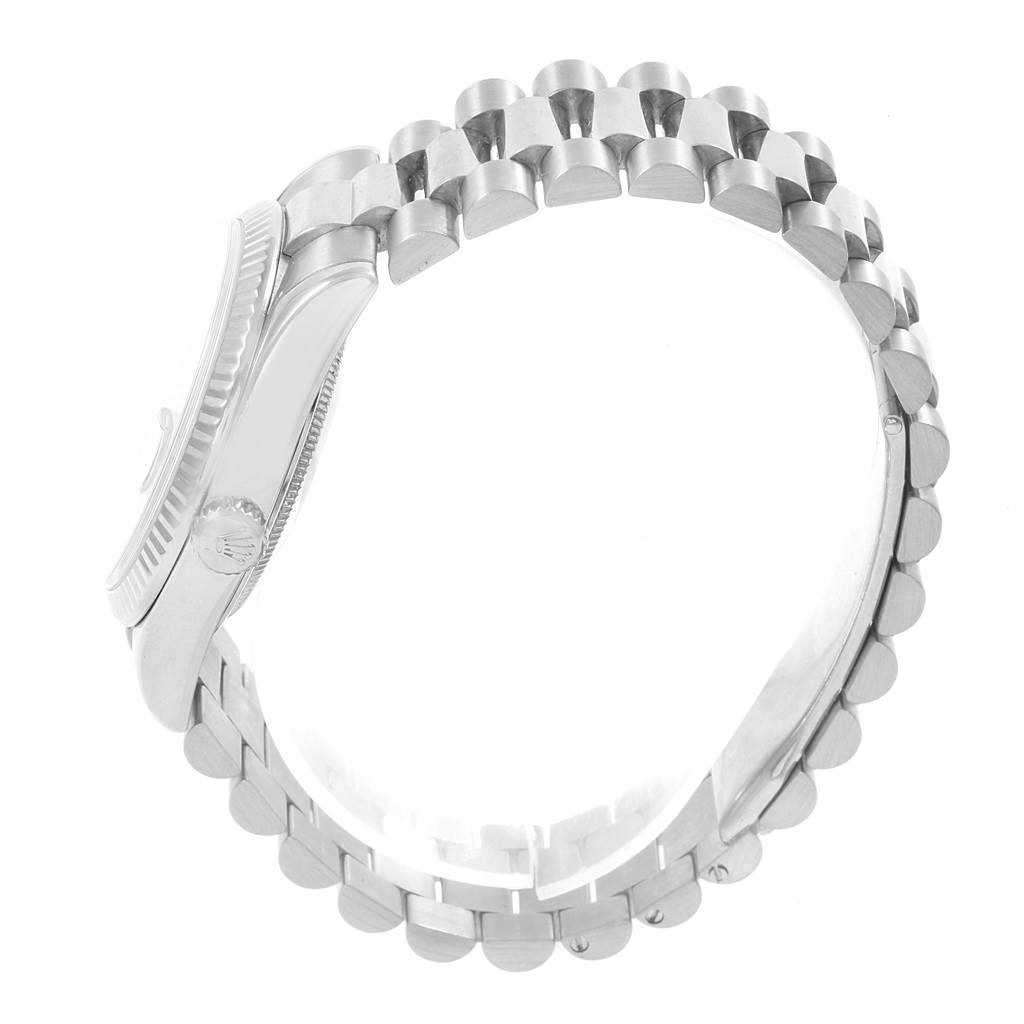 The image shows a side view of a Rolex President 118239 Men's White Gold Grey Dial 118239 Men's White Gold Grey Dial model watch, highlighting its case and partially opened bracelet.