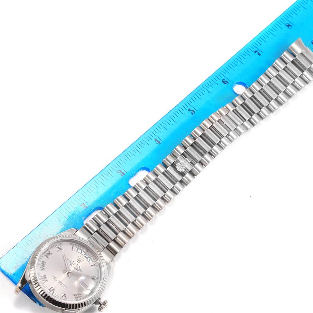 The image shows a top view of a Rolex President 118239 Men's White Gold Grey Dial 118239 Men's White Gold Grey Dial model watch, highlighting its dial, crown, and part of the bracelet measured against a ruler.