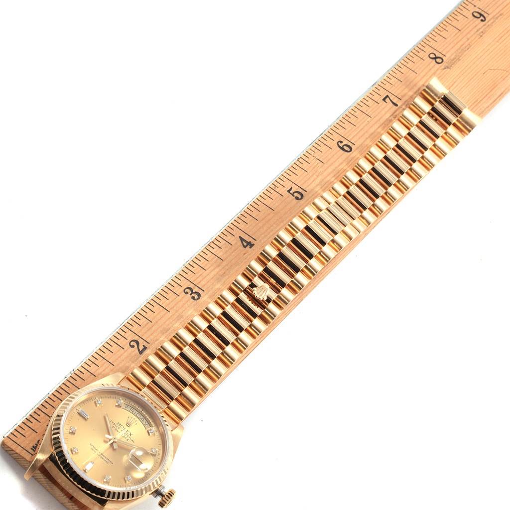 The image shows the dial and bracelet of a Rolex President 18038 Men's Yellow Gold Champagne Dial 18038 Men's Yellow Gold Champagne Dial model watch, along with a ruler for measurement.