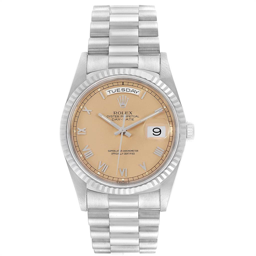 The Rolex President 18239 Men's White Gold Pink Dial 18239 Men's White Gold Pink Dial model watch is shown from a top-down angle, showcasing the full face, bracelet, and bezel.