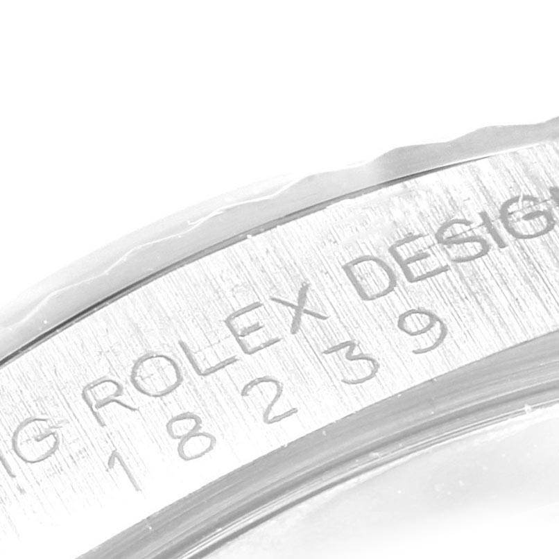Close-up of the serial number engraving on the bezel of a Rolex President 18239 Men's White Gold Pink Dial 18239 Men's White Gold Pink Dial model watch.