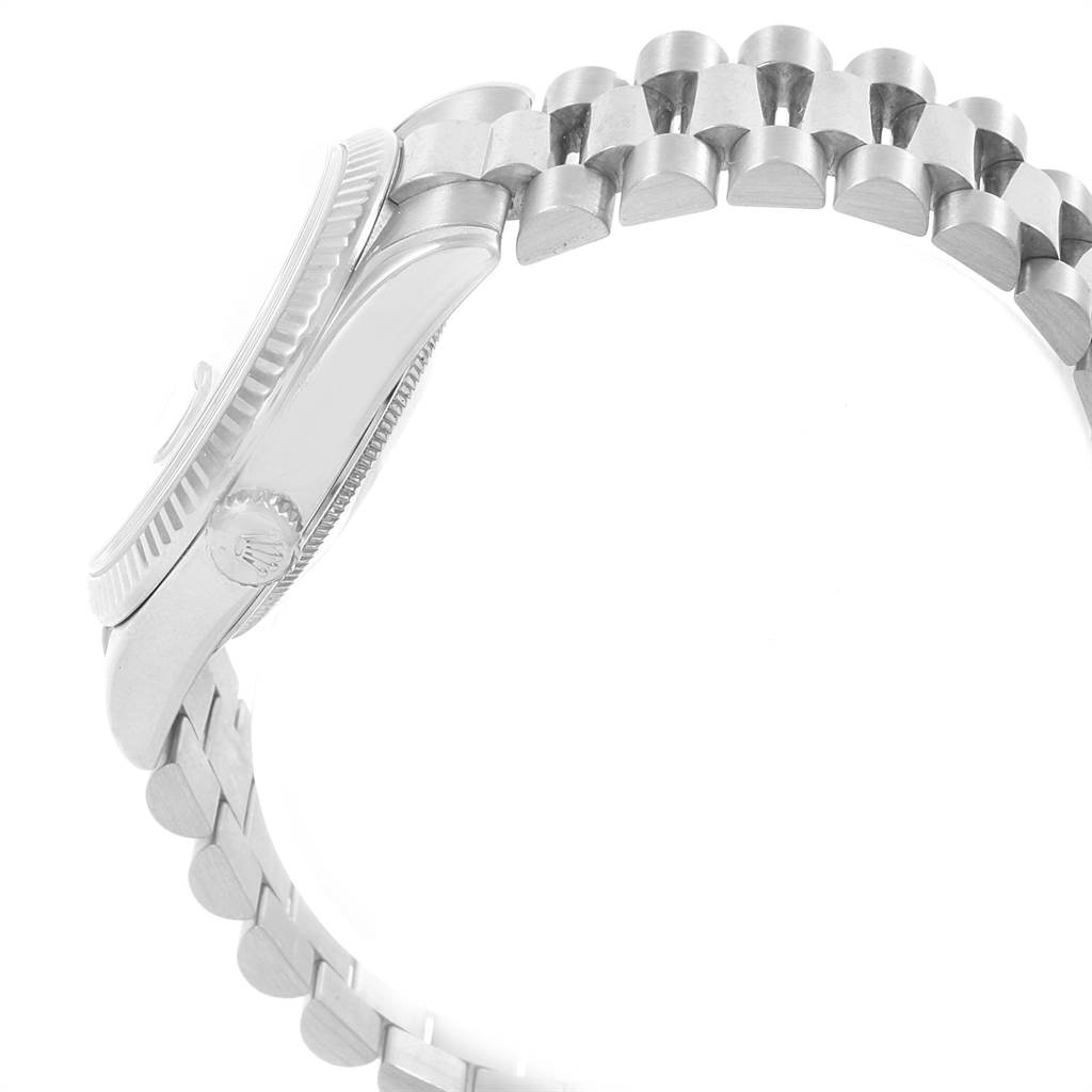 The image shows a side view of the Rolex President 18239 Men's White Gold Pink Dial 18239 Men's White Gold Pink Dial model watch, highlighting the band and part of the case and crown.