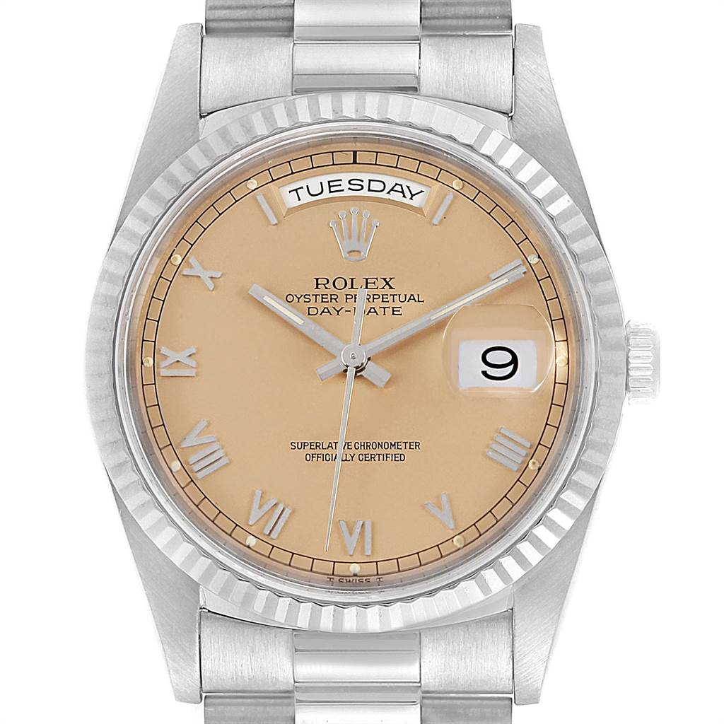 This image shows a Rolex President 18239 Men's White Gold Pink Dial 18239 Men's White Gold Pink Dial model watch face, including the dial, day and date displays, and part of the bracelet.