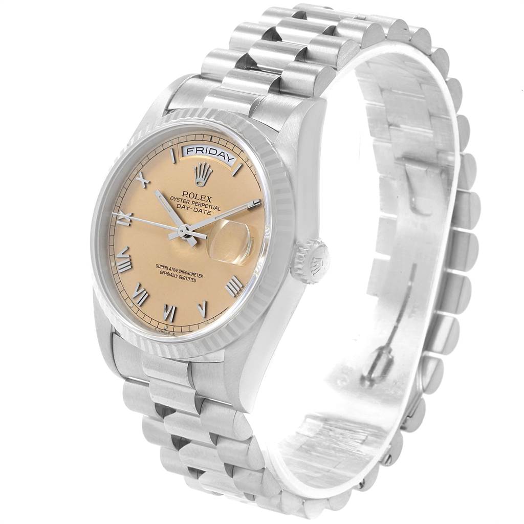 The image shows a Rolex President 18239 Men's White Gold Pink Dial 18239 Men's White Gold Pink Dial model watch at a slight angle, highlighting its dial, bezel, and bracelet.