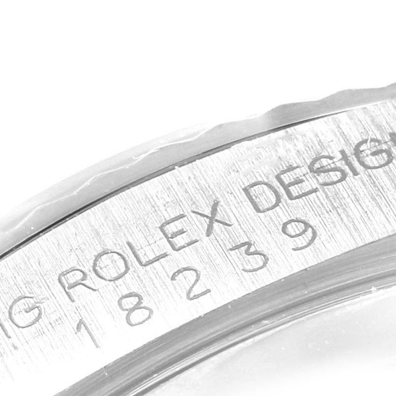 This close-up image shows the engraved bezel of a Rolex President 18239 Men's White Gold Silver Dial 18239 Men's White Gold Silver Dial model watch.
