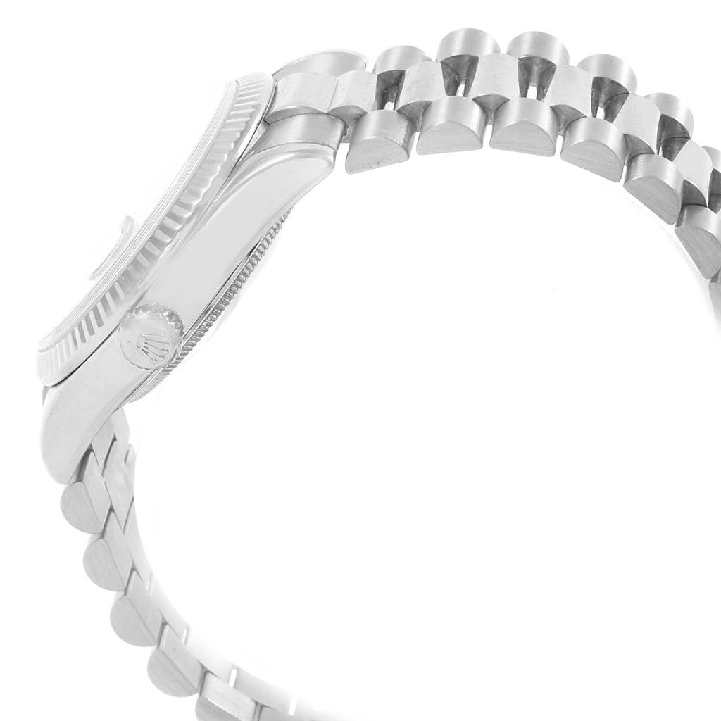 The image shows a side view of the Rolex President 18239 Men's White Gold Silver Dial 18239 Men's White Gold Silver Dial model, focusing on the bezel, crown, and bracelet.