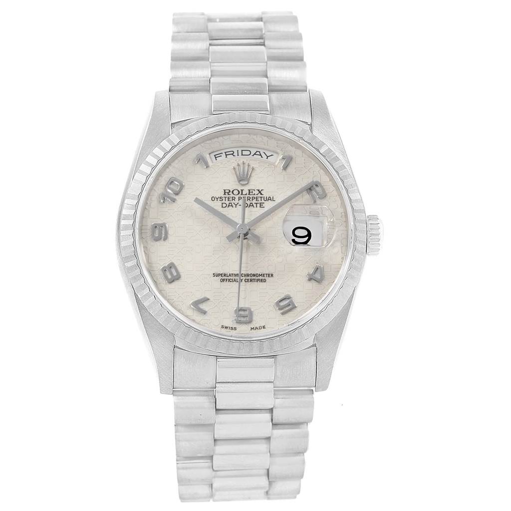 The image shows a frontal view of a Rolex President 18239 Men's White Gold Silver Dial 18239 Men's White Gold Silver Dial model watch featuring its bracelet, dial, hands, day, and date indicators.