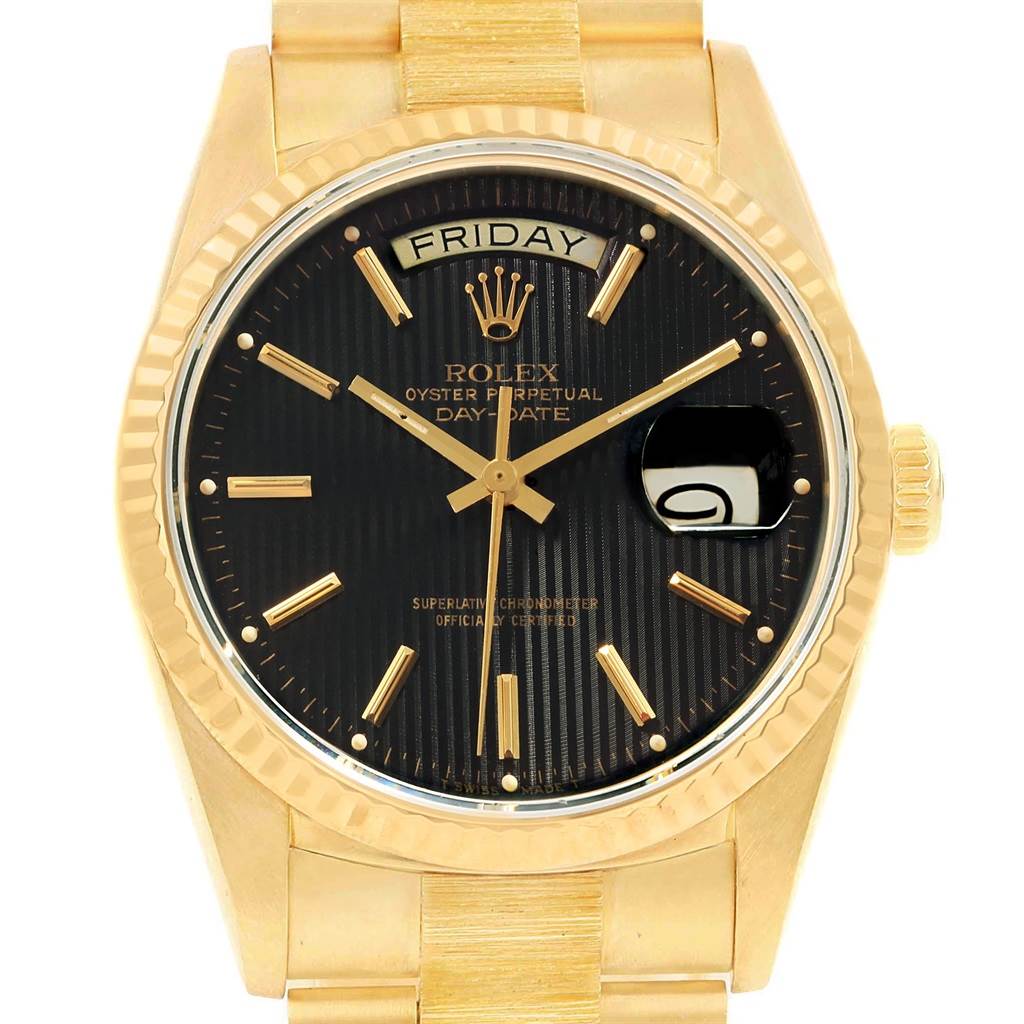 This image shows a Rolex President 18048 Men's Yellow Gold Black Dial 18048 Men's Yellow Gold Black Dial model watch from a front angle, highlighting its gold case, black dial, and day-date display.