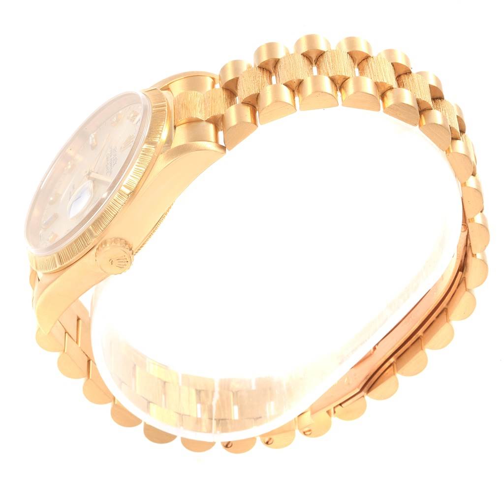 The image shows a side angle of a Rolex President 18248 Men's Yellow Gold Silver Dial 18248 Men's Yellow Gold Silver Dial model watch, highlighting the case, bezel, and bracelet.