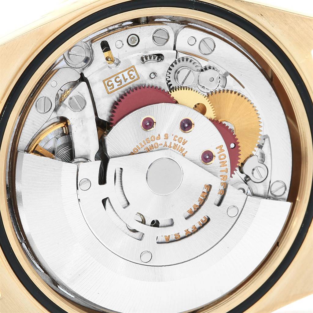 This image shows the intricate movement and internal gears of a Rolex President 18248 Men's Yellow Gold Silver Dial 18248 Men's Yellow Gold Silver Dial model watch from a back view angle.